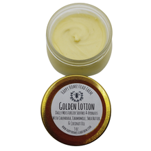 Load image into Gallery viewer, Open 3 oz jar of Golden Lotion with pale yellow moisturizer and its labeled gold lid on a white background.